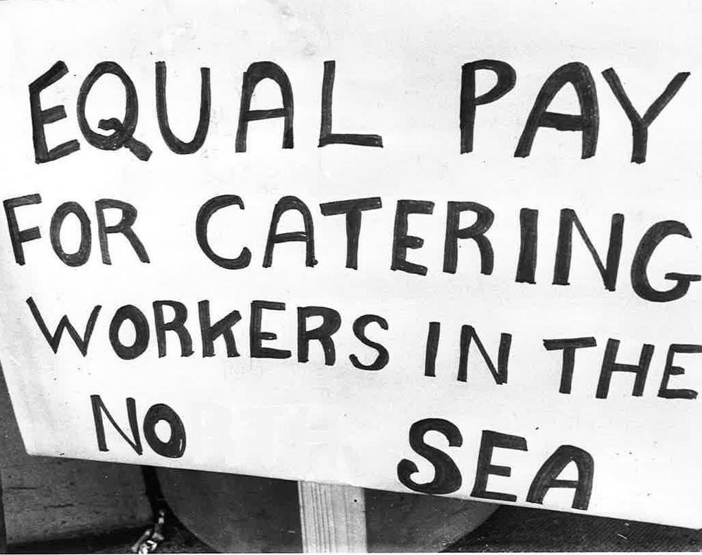 A placard makes the caterers demands in 1979