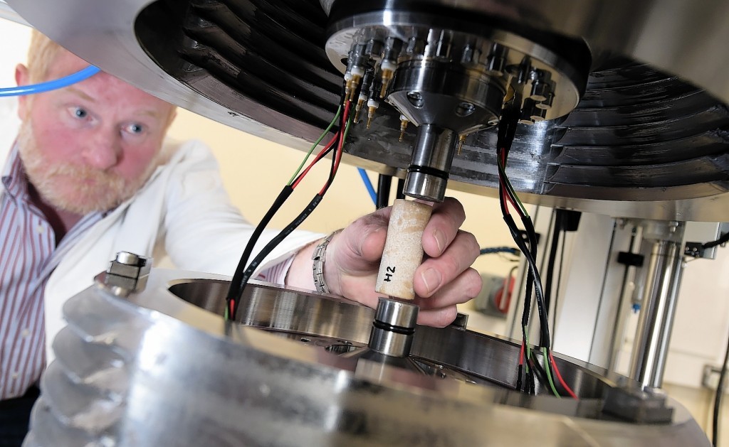 Aberdeen University unveil a £500,000 High Pressure/High Temperature Rock Deformation Apparatus, which could aid North Sea exploration and production activity, through testing rock samples.      
Pictured - Dr Dave Healy of the School of Geoscience, University of Aberdeen, working with the machine.     
Picture by Kami Thomson    04-02-16