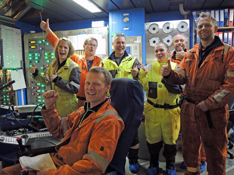 Statoil crew celebrate after drilling began on its flagship Johan Sverdrup