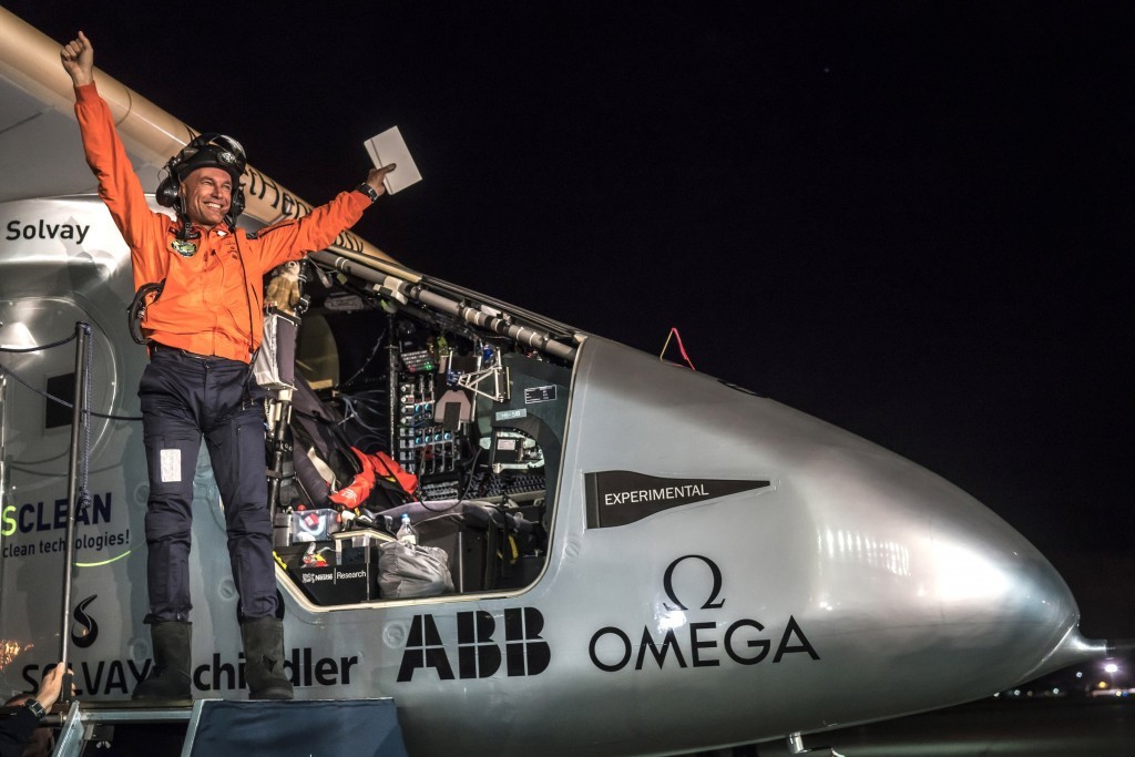 Swiss pilot Bertrand Piccard of Solar powered plane 'Solar Impulse 2', celebrates after a flight from Hawaii during its circumnavigation, at Moffett Airfield  in Silicon Valley, on April 23, 2016 in Mountain View, California. The Solar Impulse 2 is equipped with 17,000 solar cells, has a wingspan of 72 metres, and yet weighs just over 2 tonnes.