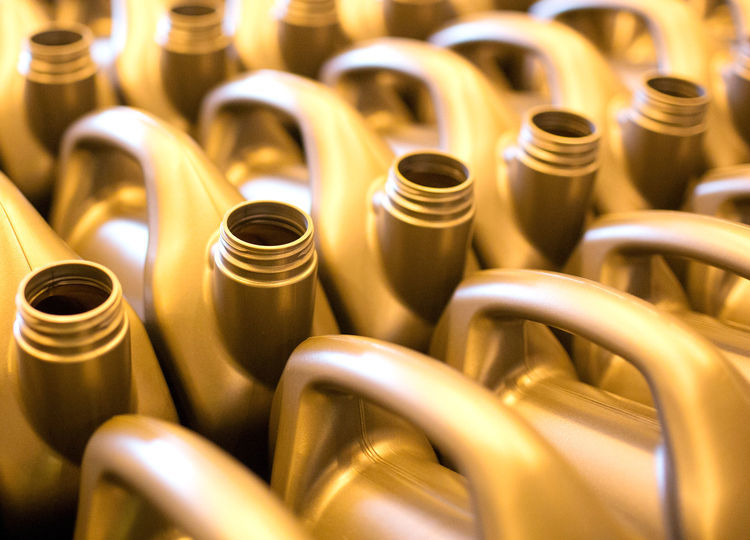 Plastic containers of Helix Ultra 5W-30 motor engine oil move along the bottling line at the Royal Dutch Shell Plc lubricants blending plant in Torzhok, Russia, on Tuesday, March 1, 2016.