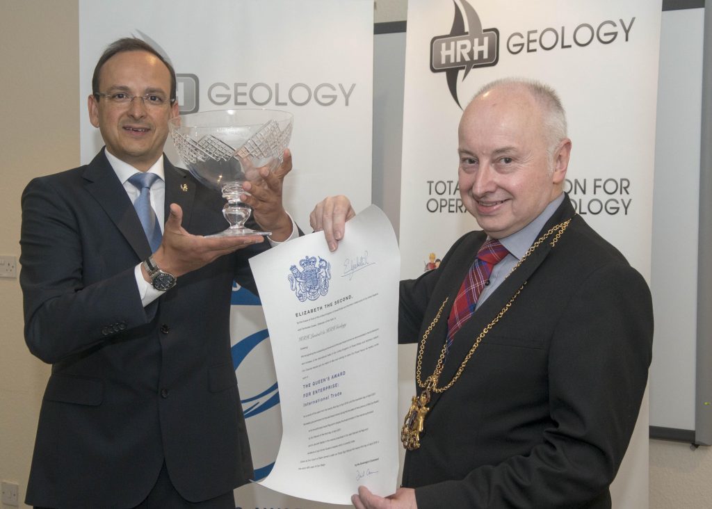 HRH managing director Dawood Khan, left, being presented with the Queen's Award by Lord Provost George Adam. Photo courtesy of Norman Adams-Aberdeen City Council