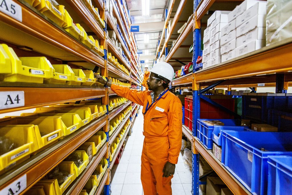 A Proserv employee in one of the firm's storerooms.