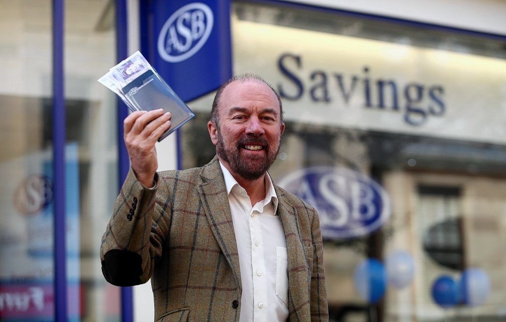 A file photo of Brian Souter opening the new Airdire Savings Bank in Falkirk, Stirlingshire.