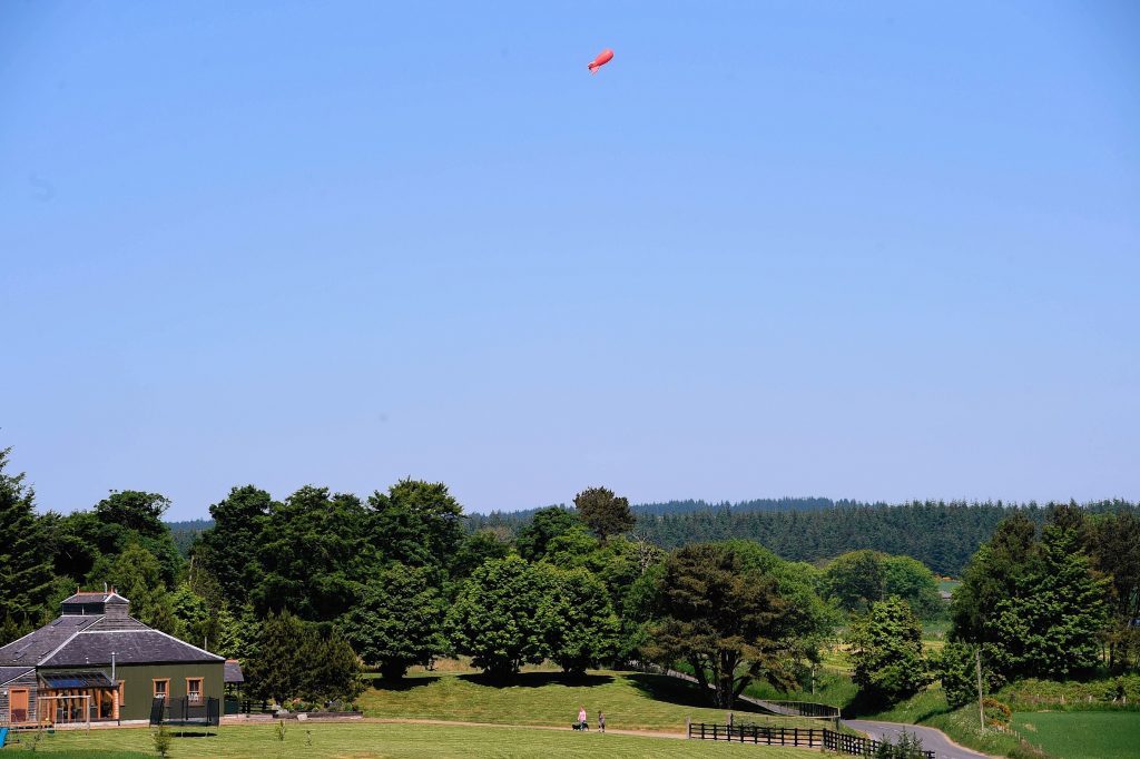 The blimp hired by Cornhill residents demonstrate the height the proposed wind turbine would reach. (Ross/Brown)