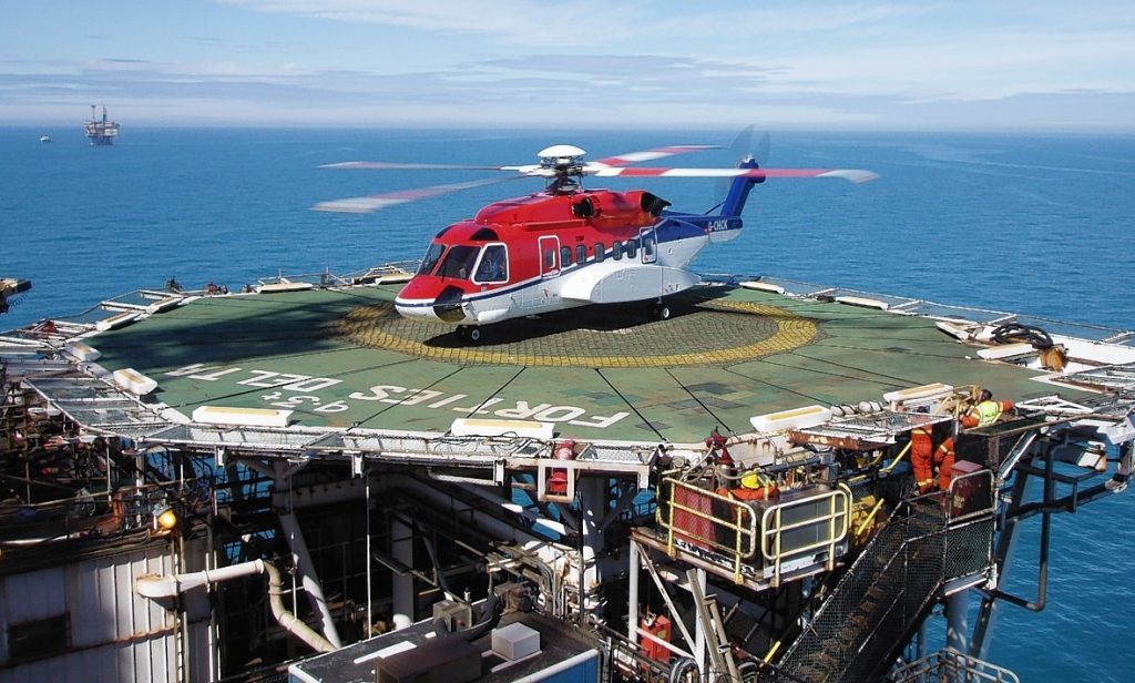 A CHC-operated S-92 helicopter on a North Sea platform
