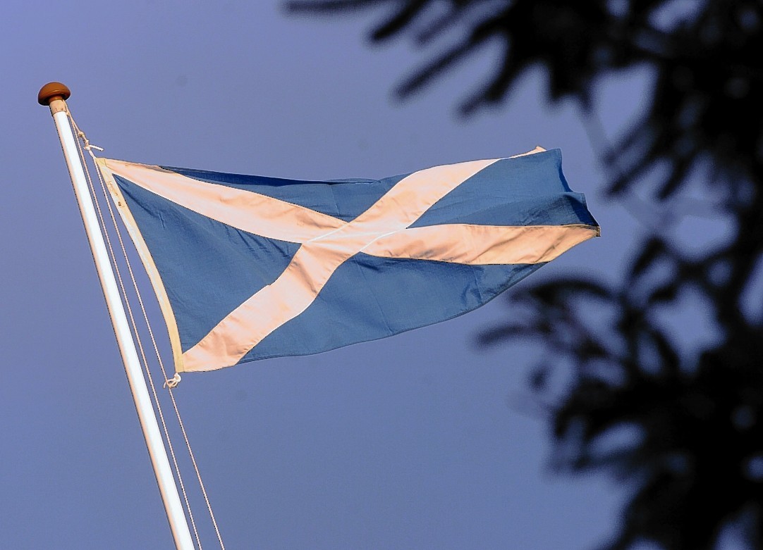 Saltire flying on the roof of Stonehaven Town Hall.
Picture by KEVIN EMSLIE          .