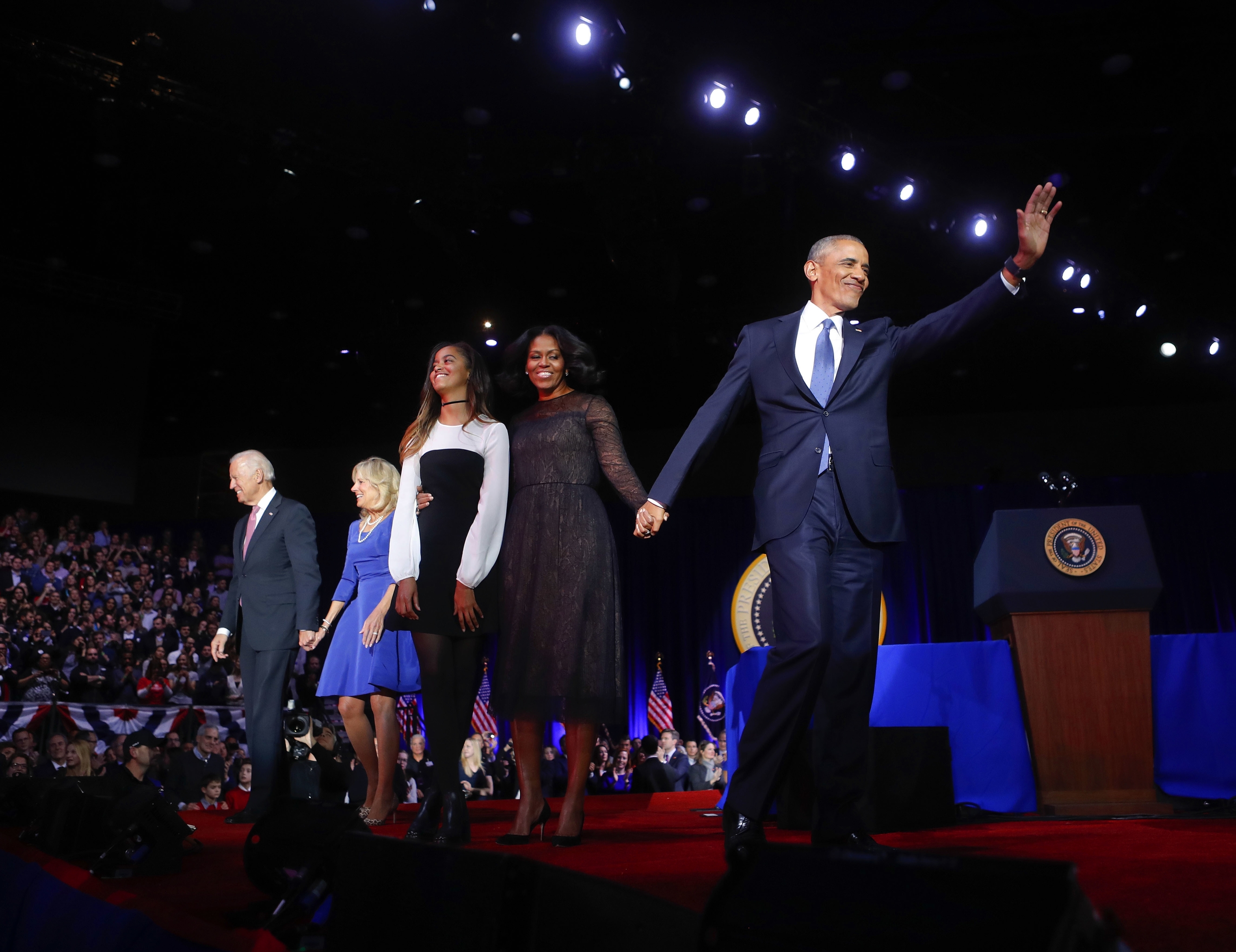 President Barack Obama waves on stage with first lady Michelle Obama, daughter Malia, Vice President Joe Biden and his wife Jill Biden after his farewell address at McCormick Place in Chicago