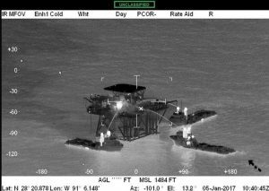 A shot of three support vessels at the scene of the fire. Coast Guard imagery courtesy of Coast Guard Aviation Training Center Mobile