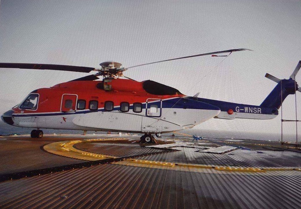 The CHC-operated S-92 aircraft on the West Franklin platform. The picture shows the nose of the aircraft sitting out over the yellow landing circle.