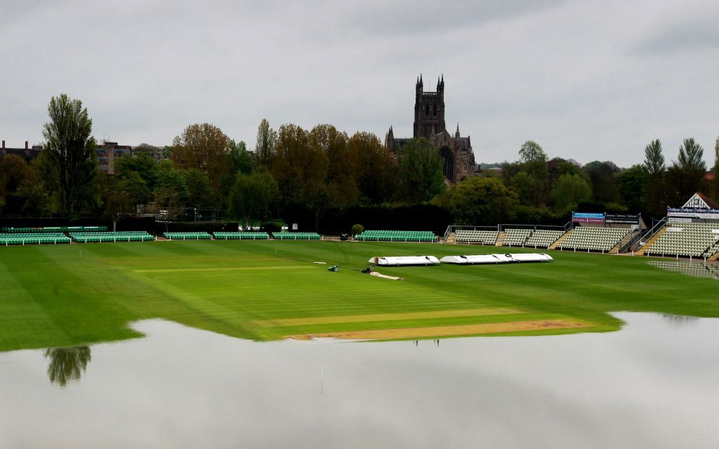 Food water encroaching on to the outfield at New Road in Worcester, the home of Worcestershire County Cricket Club. The quintessential summer sound of leather on willow is being disrupted by climate change, as cricket grounds face increased rain and flooding, green groups warn.