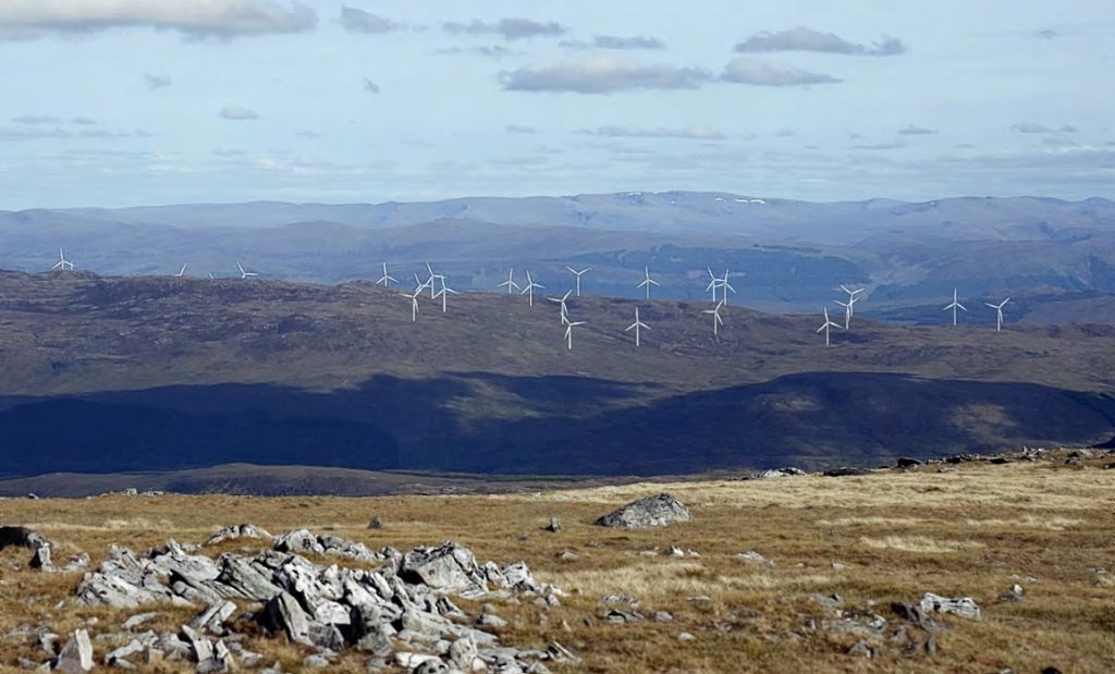 Image shows the proposed Beinneun turbines on the right, with three of the existing turbines of the operational Millennium Wind Farm visible on the far left of the image.