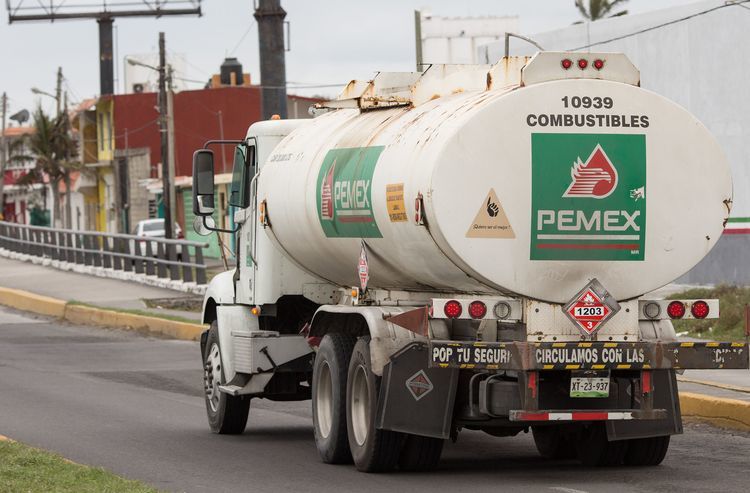 A Petroleos Mexicanos (Pemex) truck exits a supply center in Veracruz City, Mexico. Photographer: Brett Gundlock/Bloomberg