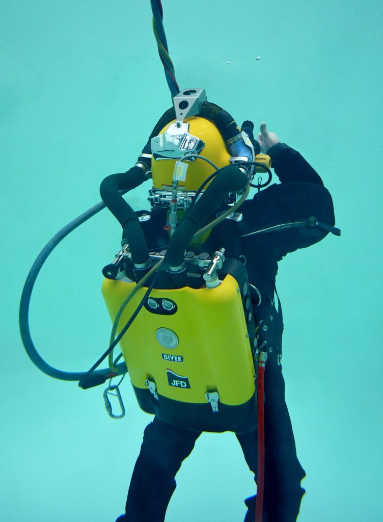Diver in test tank performing trials on COBRA equipment