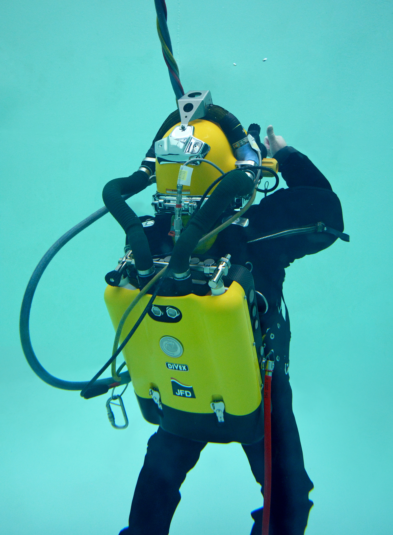 Diver in test tank performing trials on COBRA equipment
