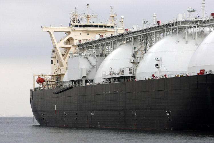 A liquefied natural gas (LNG) tanker operated by Energy Advance Co., a unit of Tokyo Gas Co., is moored at the company's Sodegaura plant in Sodegaura City, Chiba Prefecture, Japan, on Thursday, March 22, 2012. Photographer: Tomohiro Ohsumi/Bloomberg