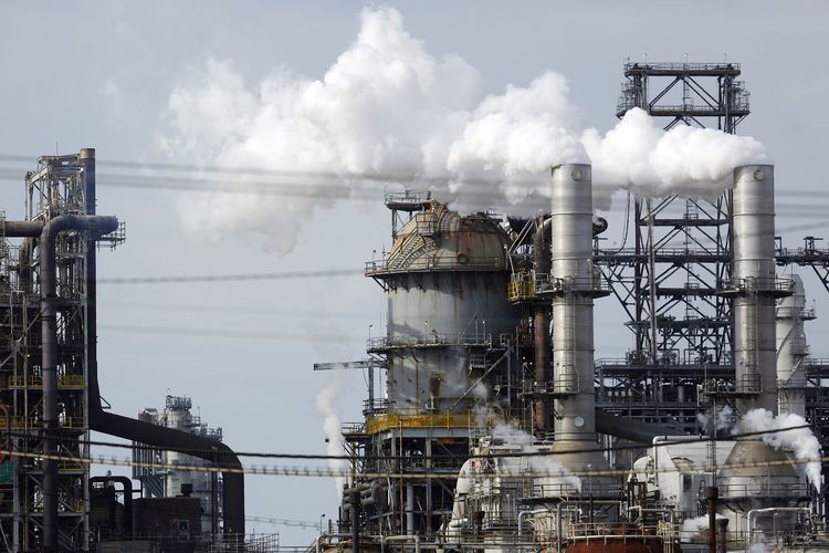 Emissions rise from the Phillips 66 Wood River Refinery in Roxana, Illinois, U.S..