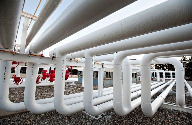 A series of pipes direct natural gas at a Williston Basin Interstate Pipeline Company, a subsidiary of MDU Resources Group, Inc., compression station in Bismarck, North Dakota, U.S., on Friday, Feb. 10, 2012. Photographer: Daniel Acker/Bloomberg