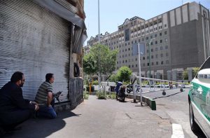 Security personnel take position in front of Iran's parliament building after an assault by several attackers, in Tehran, Iran, Wednesday, June 7, 2017. Suicide bombers and gunmen stormed into Iran's parliament and targeted the shrine of Ayatollah Ruhollah Khomeini on Wednesday, killing a security guard and wounding several other people in rare twin attacks, with the siege at the legislature still underway. (AP Photo/Fars News Agency, Omid Vahabzadeh)