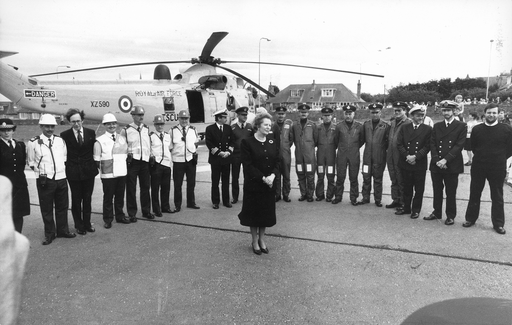 The mood of the nation is reflected on the face of Mrs Thatcher as she arrives at Aberdeen Royal Infirmary's helipad to meet some of the front-line rescue workers involved in the Piper Alpha disaster.  She also met some of the survivors and hospital staff who are caring for them,   09/07/1988