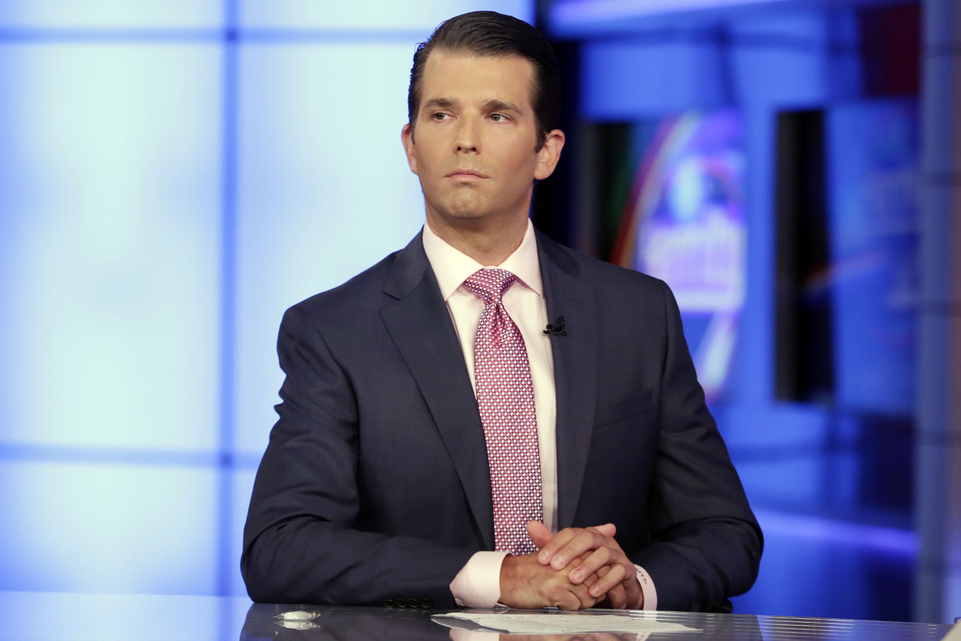 Donald Trump Jr. is interviewed by host Sean Hannity on his Fox News Channel television program, in New York