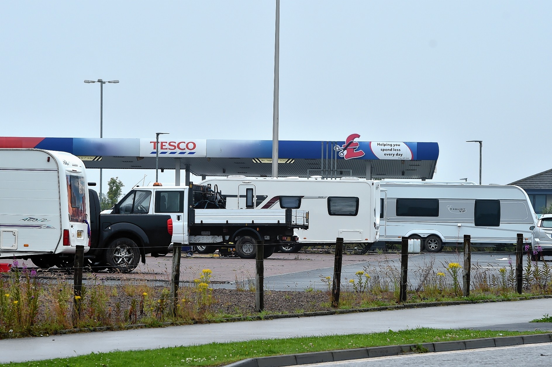 Travellers has pitched up at a car park next to Tesco Petrol station, Prospect Road, Arnhall Business Park, Westhill.