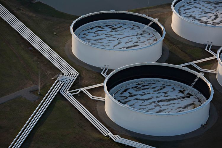 Oil storage tanks stand in this aerial photograph taken above Cushing, Oklahoma. Photographer: Daniel Acker/Bloomberg