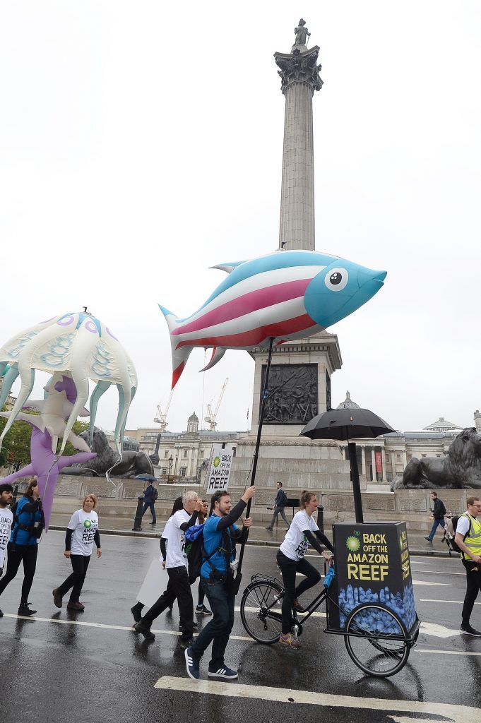 Greenpeace protesters with inflatable sea creatures march from the Mall in London to BP headquarters in St James Square in protest about oil drilling.