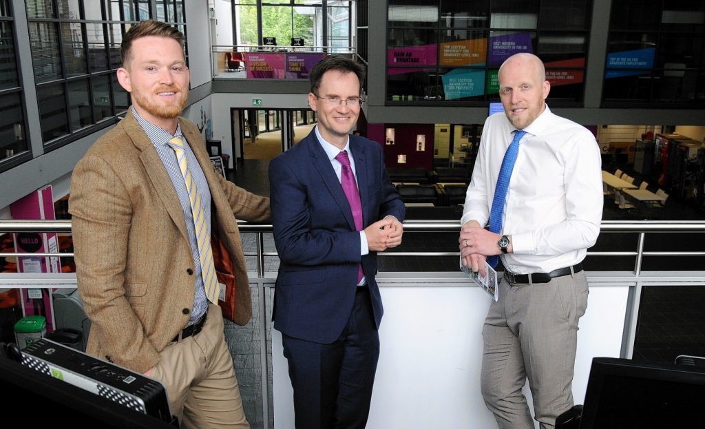 Dr Ian Broadbent, senior Lecturer and MBA Director with Robert Gordon Univeristy (centre) with students Kris Lindahl (left) and Ross Bremner (right). See business story MBA Oil and Gas management.
Picture by COLIN RENNIE  June 8, 2017.