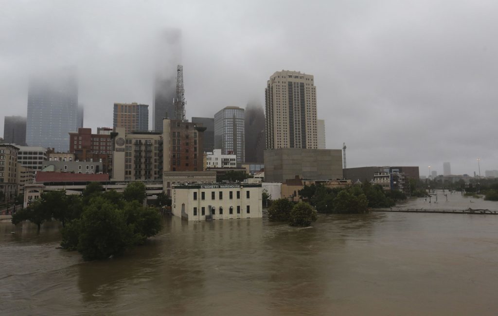 Floodwaters from Tropical Storm Harvey flow in the Buffalo Bayou in downtown Houston, Texas