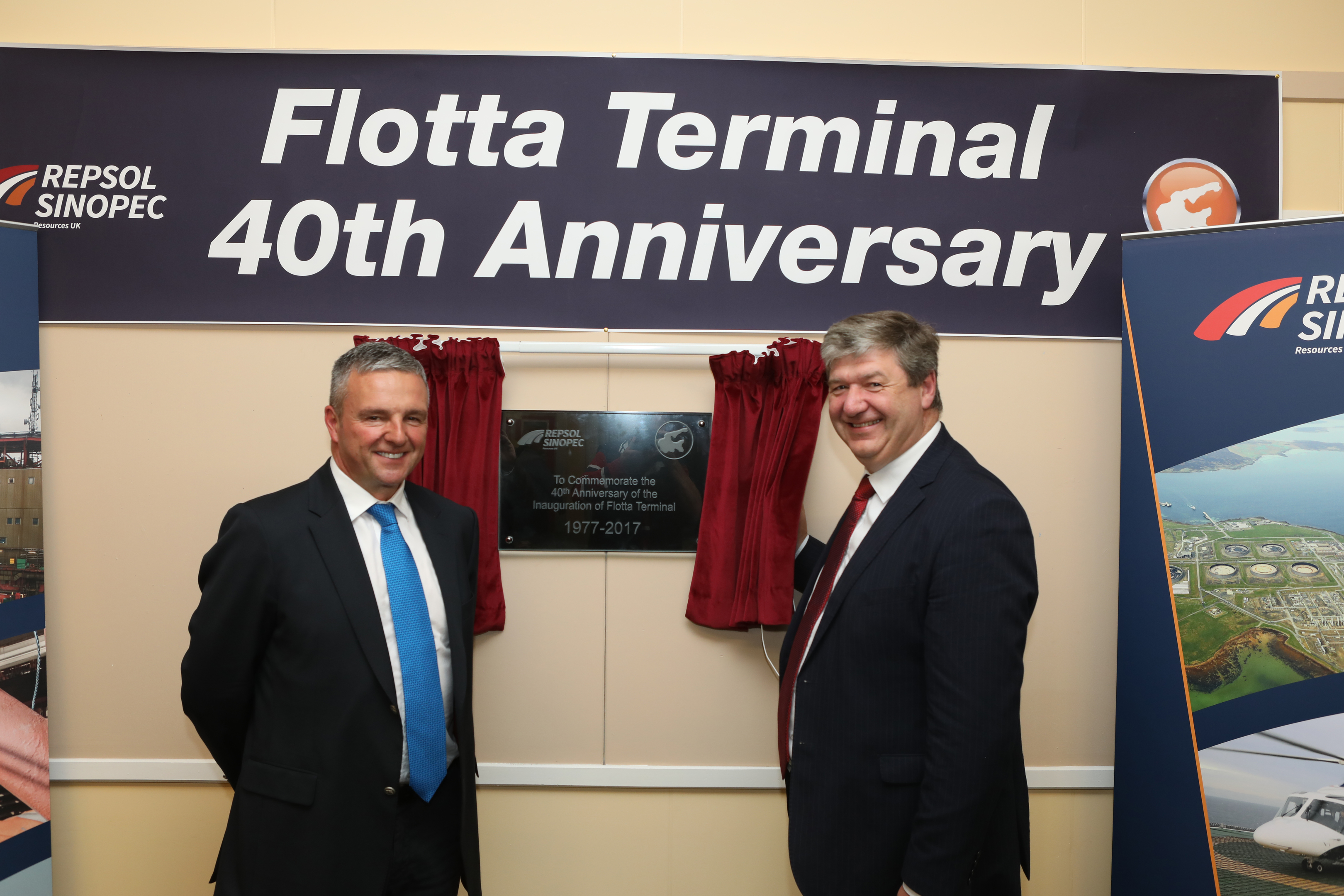 RSRUK managing director Bill Dunnett, right, and MP for Orkney and Shetland Alistair Carmichael unveil the plaque celebrating the Flotta terminal's 40th birthday.