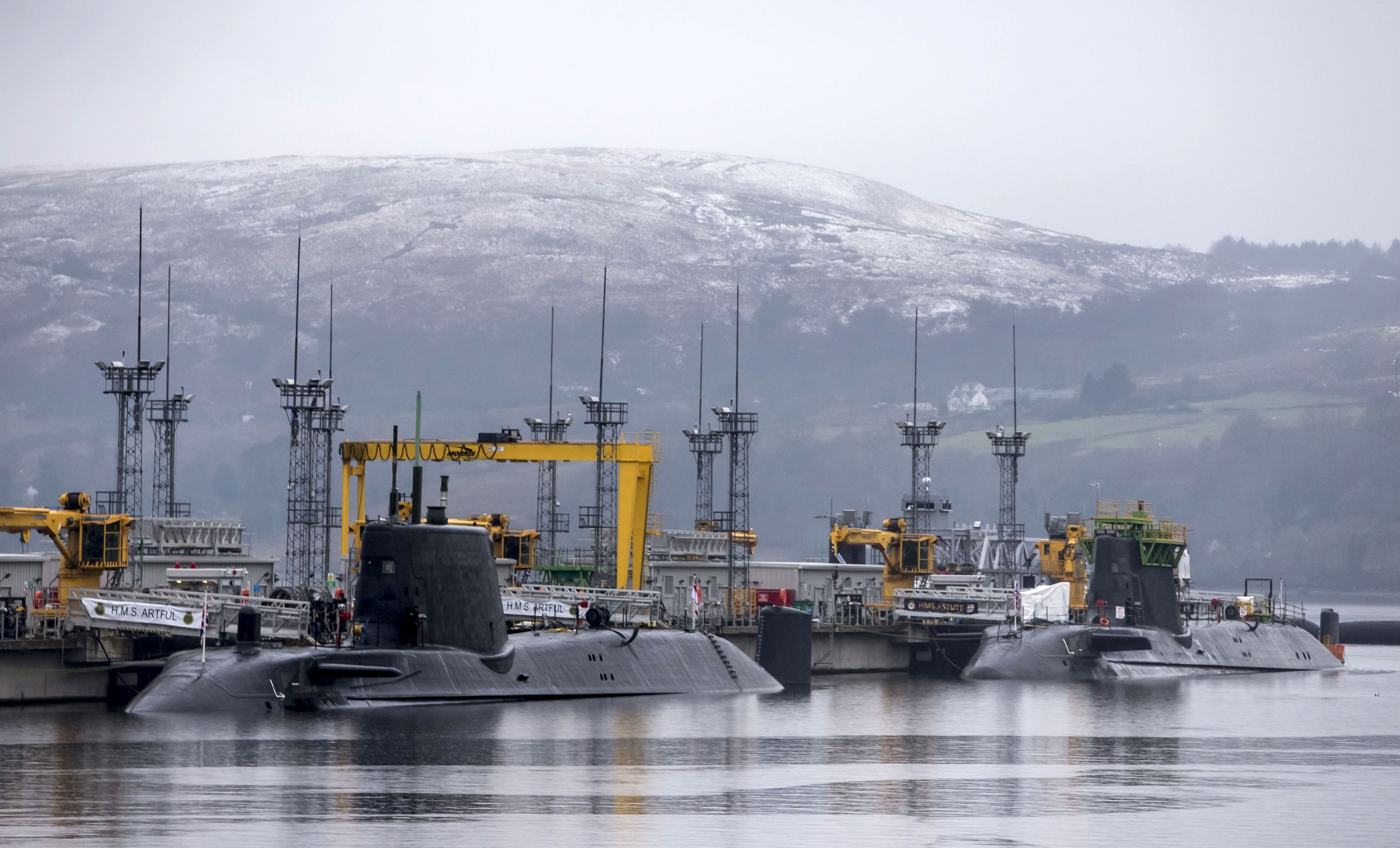 Astute-class submarines HMS Artful (left) and HMS Astute (right), at HM Naval Base Clyde, also known as Faslane, ahead of a visit by Defence Secretary Michael Fallon.