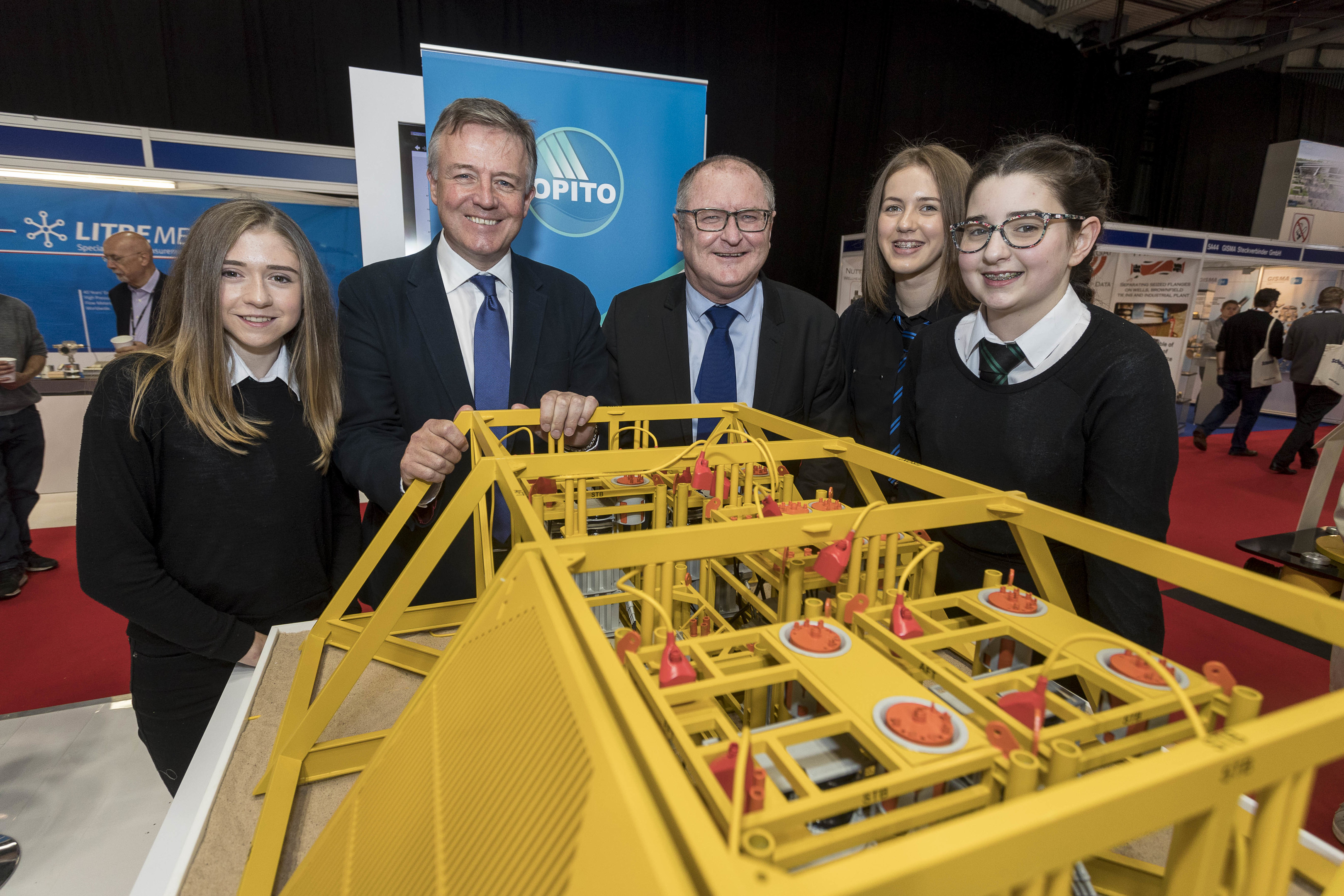 OPITO International chairman Gordon Ballard with OPITO chief executive John McDonald with Turriff Academy pupils Vicki Elder, Christina Mair and Molly Mathieson.jpg