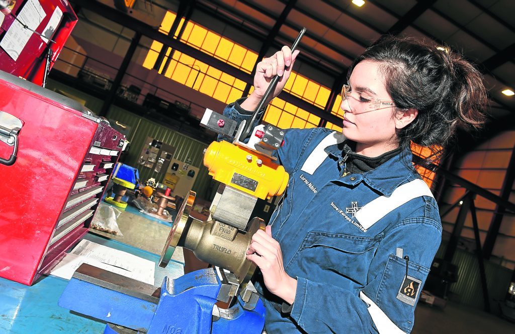Score Marine Ltd apprentice Lorna Noble (valve technician) working at their warehouse in Peterhead.