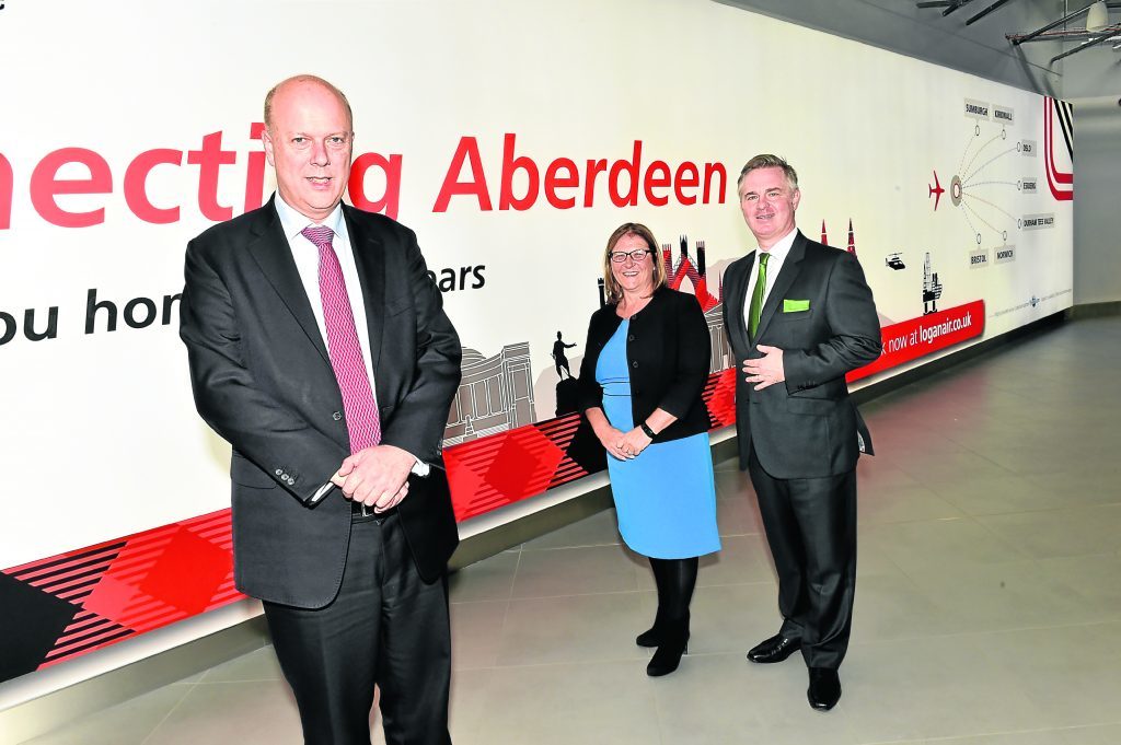 VISIT: Chris Grayling with Aberdeen Airport MD Carol Benzie and MP Colin Clark. Photograph by Colin Rennie