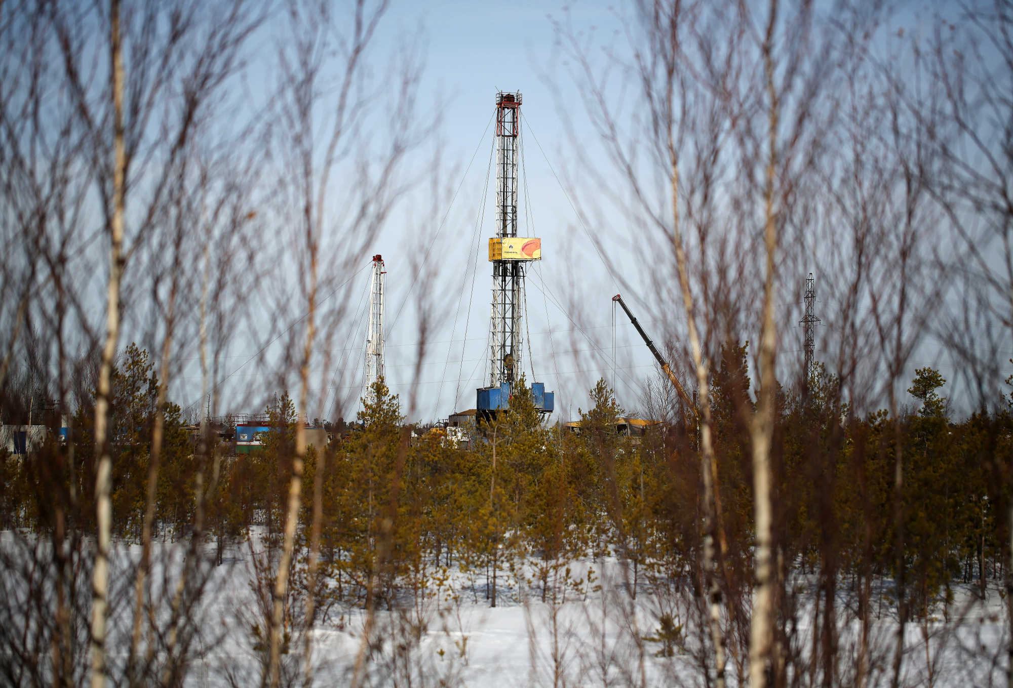 A drilling rig stands in an oilfield in Russia. Photographer: Andrey Rudakov/Bloomberg