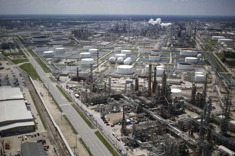 A Marathon Petroleum Corp. oil refinery stands in this aerial photograph taken above Texas City, Texas, U.S., on Wednesday, Aug. 30, 2017. Unprecedented flooding from the Category 4 storm that slammed into the state's coast last week, sending gasoline prices surging as oil refineries shut, may also set a record for rainfall in the contiguous U.S., the weather service said Tuesday. Photographer: Luke Sharrett/Bloomberg