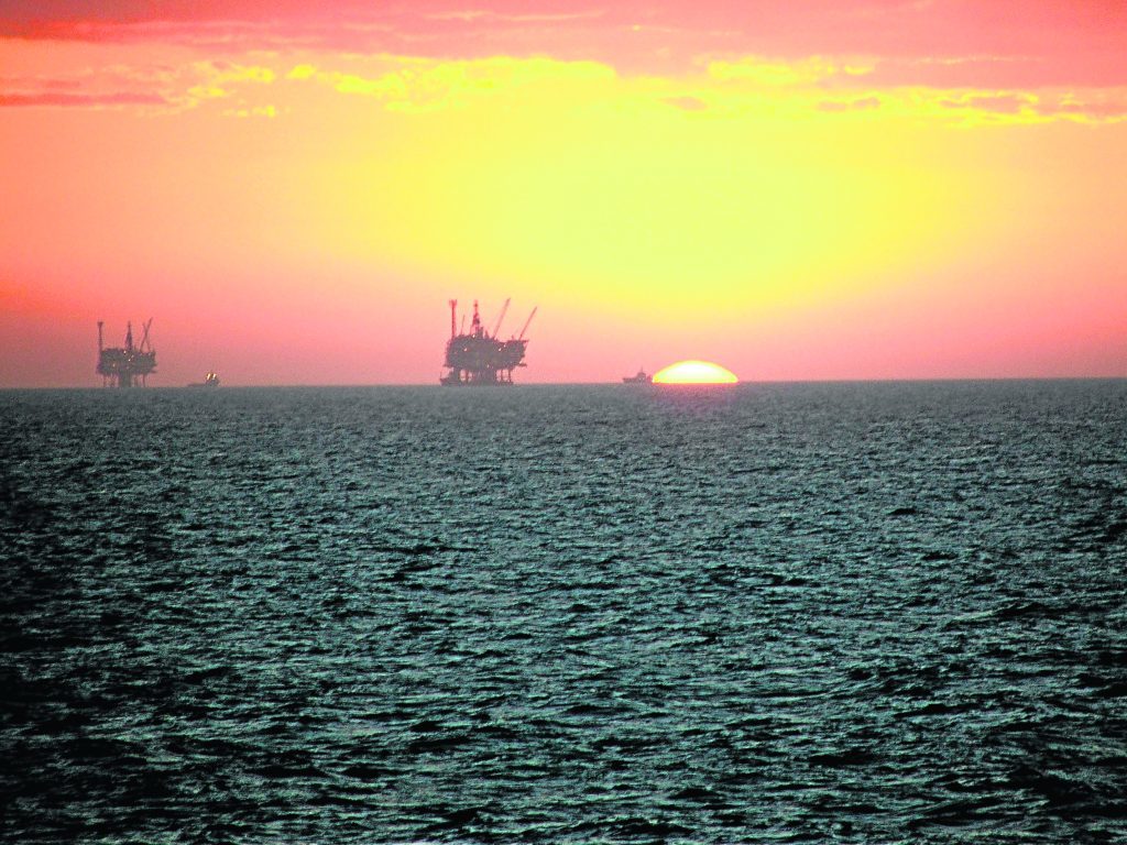 Two of the Forties Field Platforms at sunset. Stewart Crockett (Elgin)