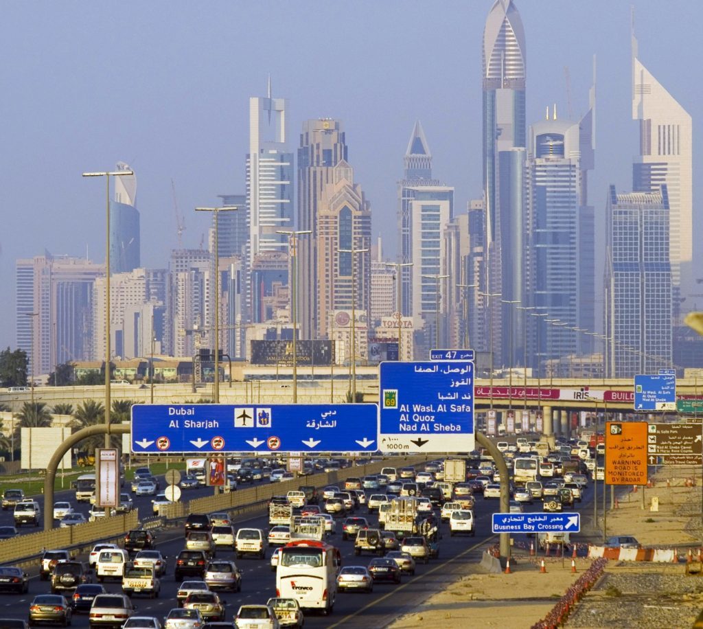 Commuters travel down Sheikh Zayed Road into Dubai, United Arab Emirates, on Sunday, Nov. 4, 2007. Dubai is situated on the Persian Gulf coast of the U.A.E. Photographer: CHARLES CROWELL