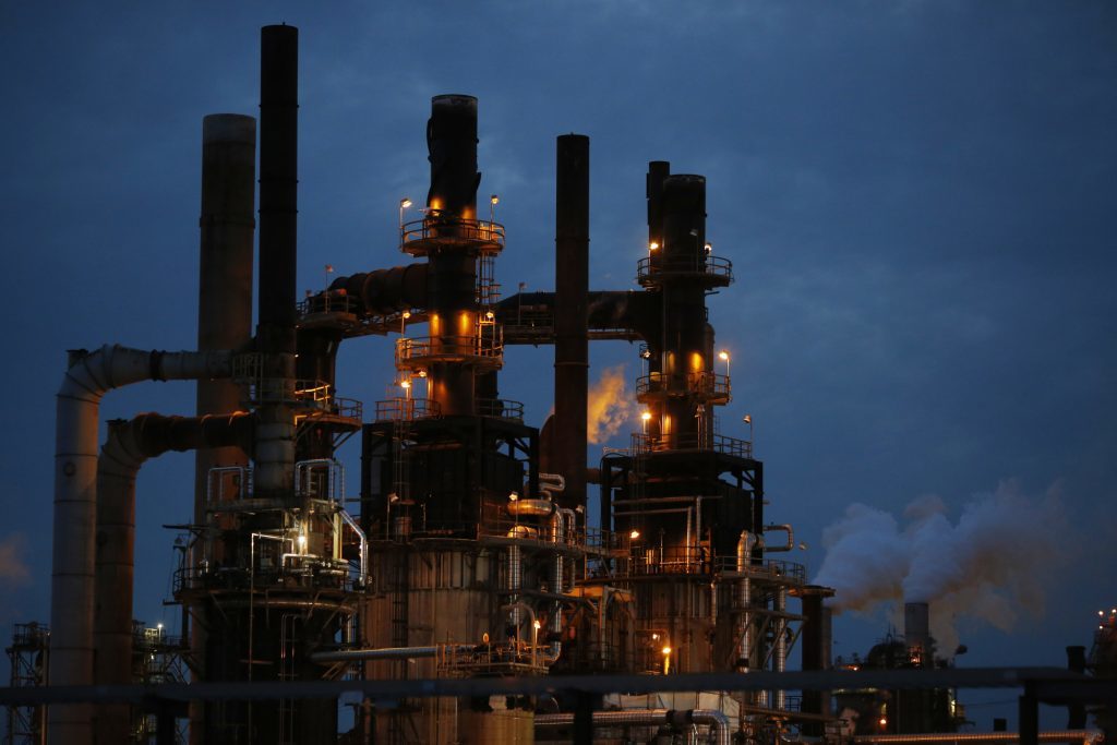 The Phillips 66 Wood River Refinery stands at dusk in Roxana, Illinois, U.S., on Tuesday, April 24, 2017. Photographer: Luke Sharrett/Bloomberg