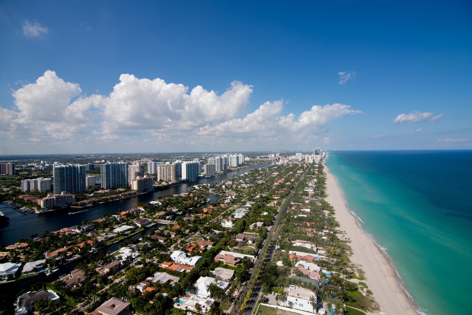 Beachfront homes are seen in the view from the penthouse of the Regalia luxury condominium in Miami Beach, Florida, U.S., on Tuesday, Feb. 11, 2014.  Photographer: Christina Mendenhall/Bloomberg