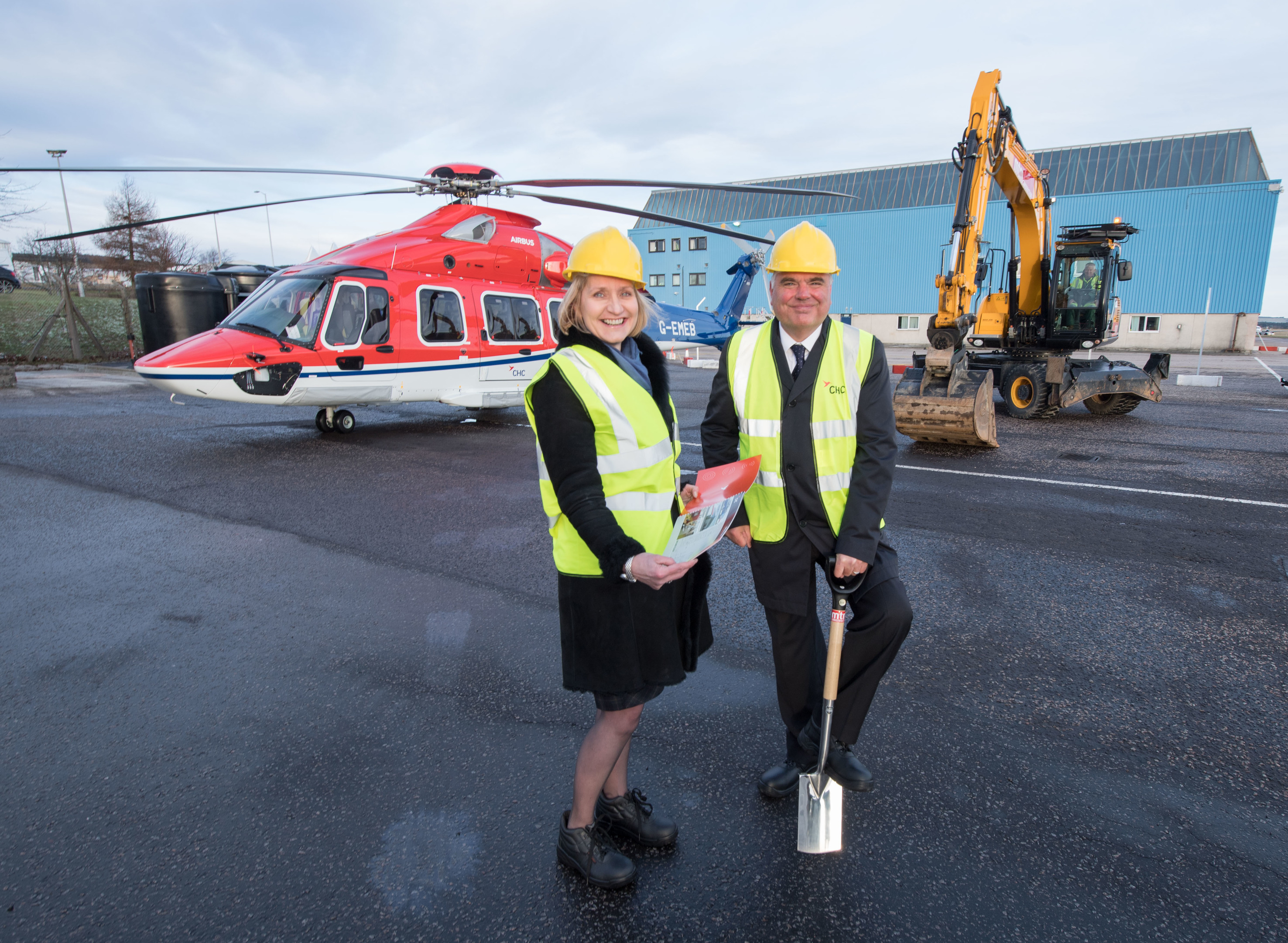 OGUK chief executive Deirdre Michie and CHC regional director Mark Abbey breaking ground as the revamp of CHC's heliport gets under way.