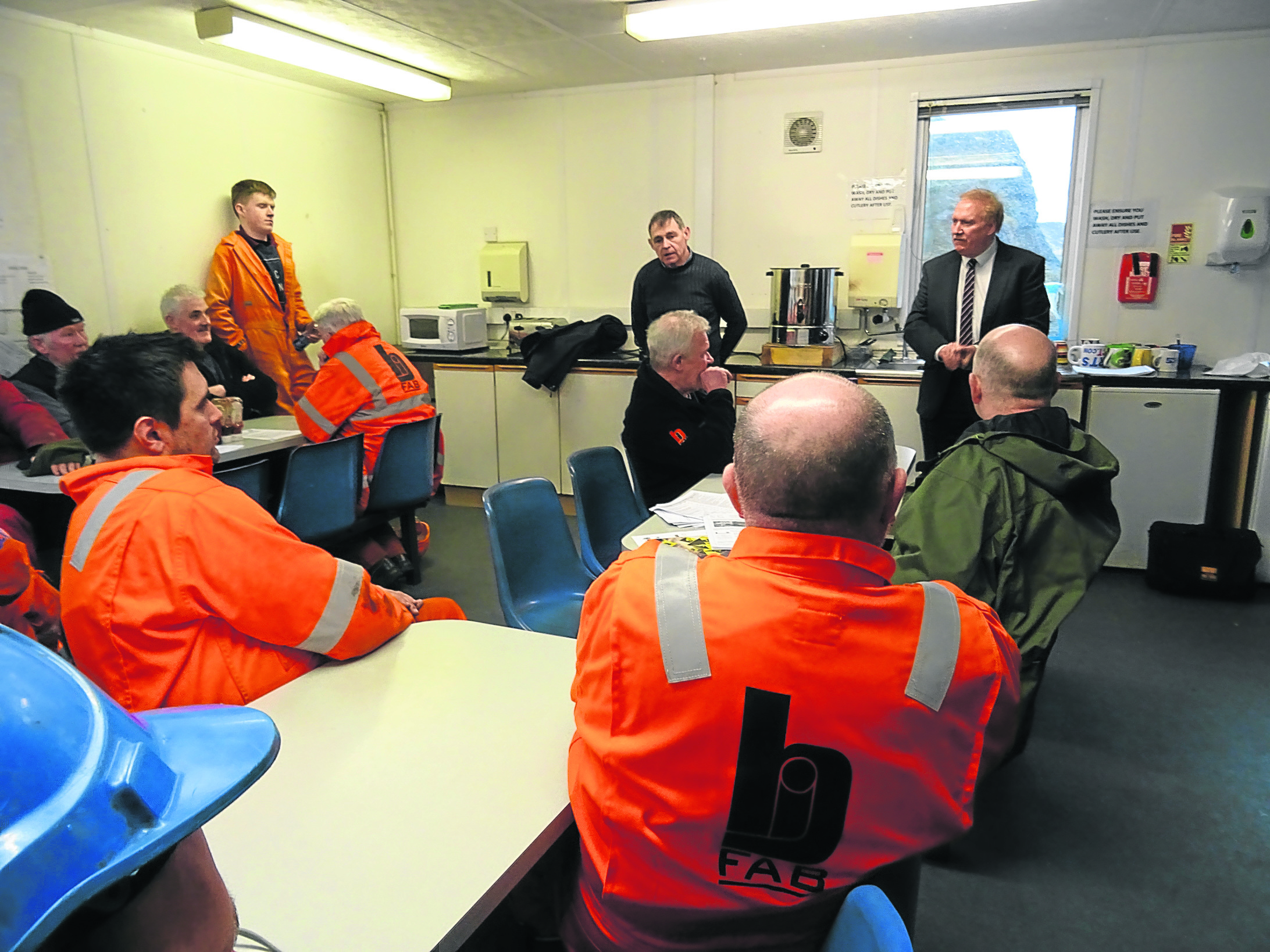 The GMS’s Alan Ritchie (wearing tie) speaks to Arnish BiFab workers but there is little optimism