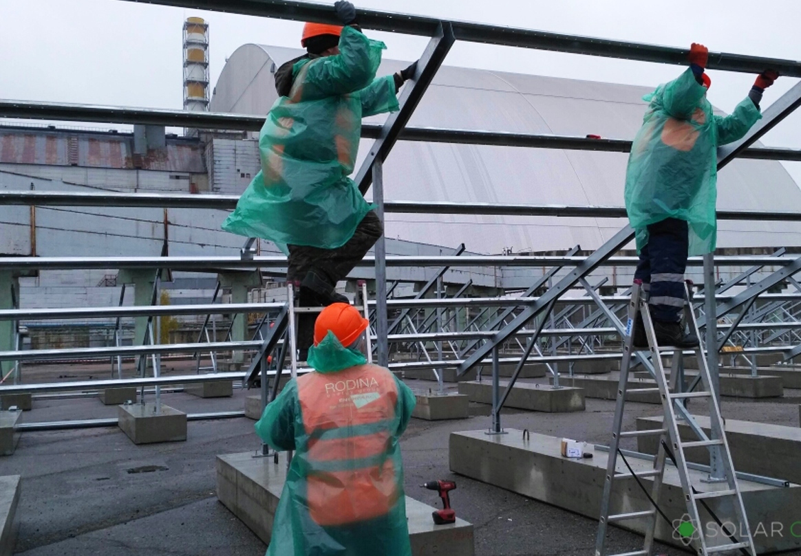 The Solar Chernobyl project is being built just a stones throw from the original reactors new safe confinement unit.