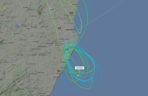 The plane was forced to circle overhead.