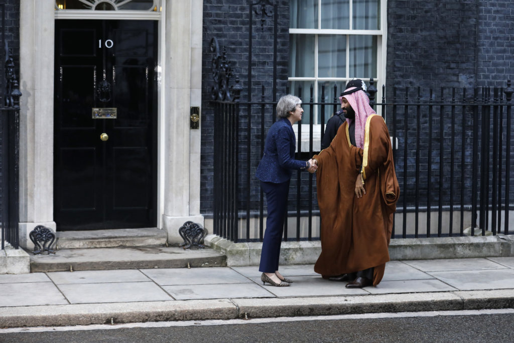 Theresa May, U.K. prime minister, left, greets Mohammed bin Salman, Saudi Arabia's crown prince, outside number 10 Downing Street in London, U.K., on Wednesday, March 7, 2018. Photographer: Luke MacGregor/Bloomberg
