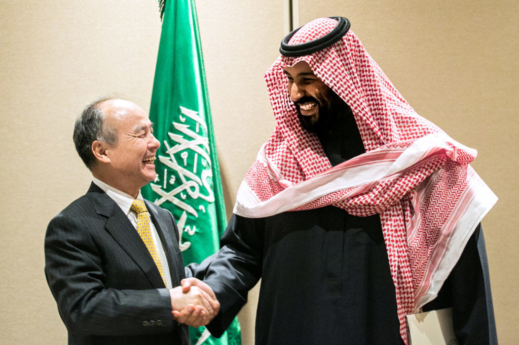 Masayoshi Son, chairman and chief executive officer of SoftBank Group Corp., and Mohammed bin Salman, Saudi Arabia's crown prince. Photographer: Jeenah Moon/Bloomberg