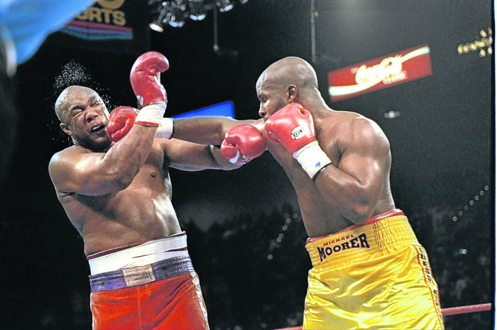 The way that the 45-year-old George Foreman, left, came back from this battering by Michael Moorer in Las Vegas 24 years ago has inspired the theme of the Energy Voice event