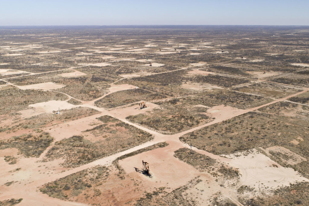 Pumpjacks operate on oil wells in the Permian Basin. Photographer: Daniel Acker/Bloomberg
