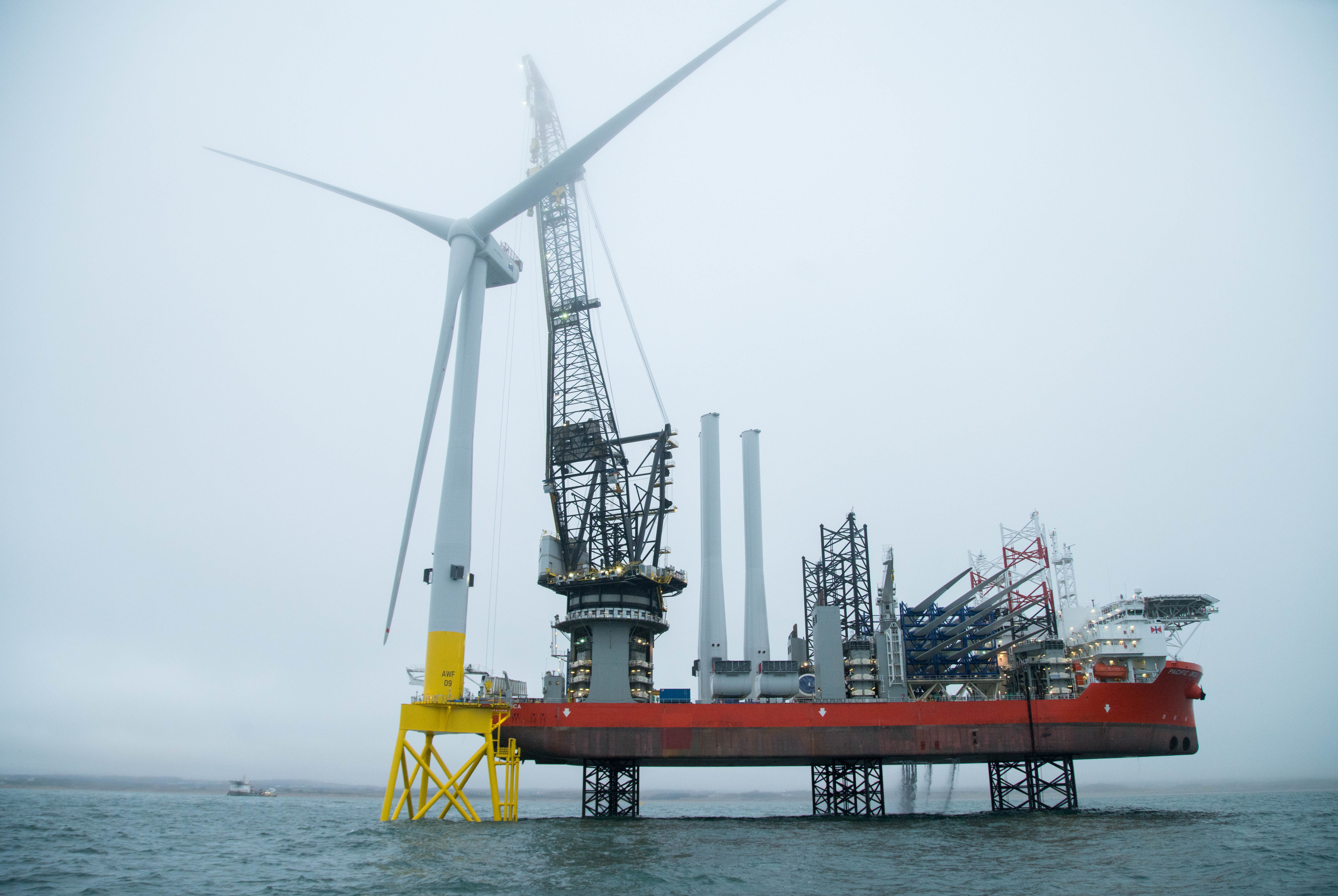 An offshore wind farm being constructed.